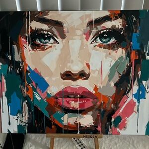 Woman face painting already framed